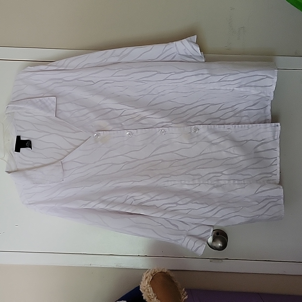 White blouse with 1 stain to it